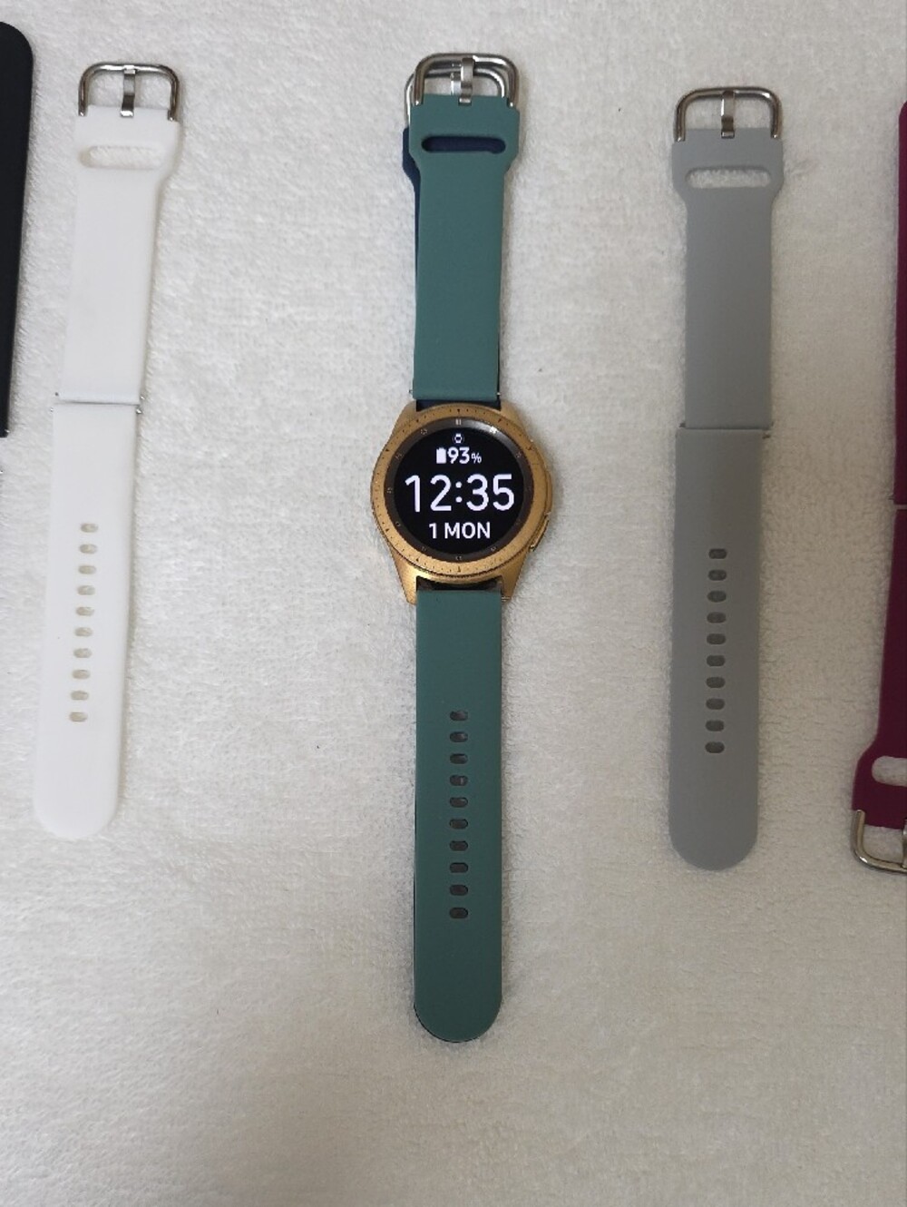 SamsungSmartwatch with Navy Band and Six Interchangeable Silicone Straps/Charger - Picture 6 of 16